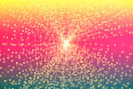 Multicolored defocused bokeh lights background.colorful toning