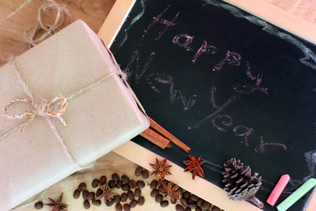 Chalkboard with gift box and rustic decorations