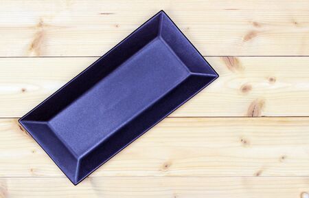 ceramic plate on the wooden ground