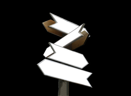 old wooden arrows road sign isolated on black