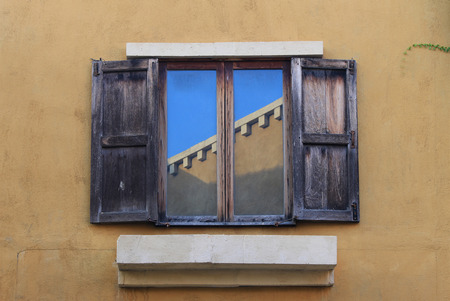 Open Old Window On Brick Wallの写真素材