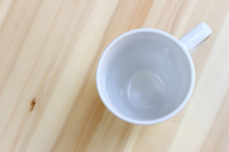 Top view tea cup on wood tableの写真素材