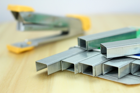 a close-up stapler with staples select focus