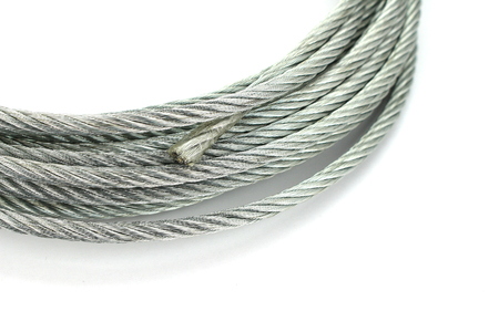 Steel wire rope cable closeup on white