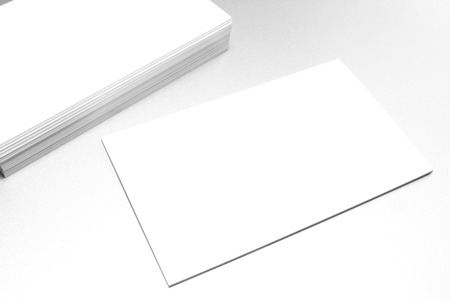 Mockup of business cards on white textured paper background