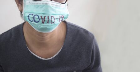 man wearing hygienic face masks for covid-19 virus protection