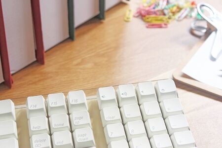 Workspace with office equipments on wood desk work background