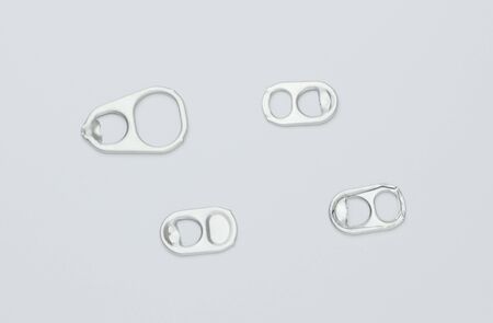 Aluminum can open loop on whiteの写真素材