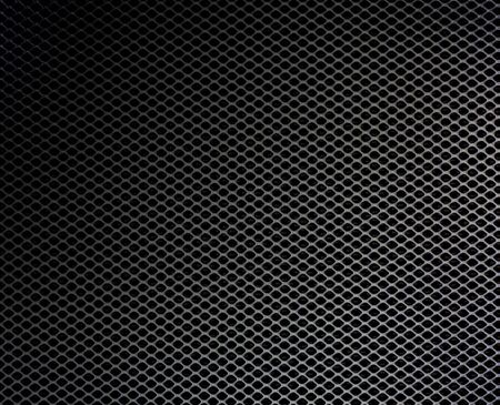 creative hole net grate on gray backgroundの写真素材