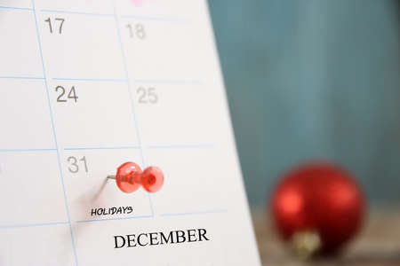 Red pin on the 31st of end day of the year 2021 on diary calendar.concept happy new year and eve dayの写真素材