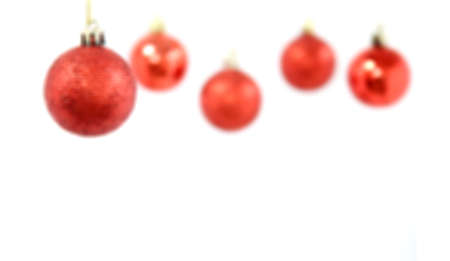 blurred red Christmas ball isolated on white backgroundの写真素材