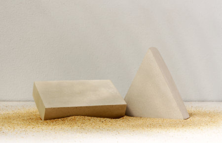 podiums on the sand for presentation show product cosmetic display , stage pedestal or platform backgroundの写真素材