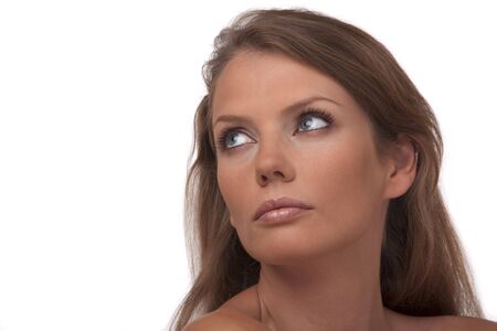 Portrait, beautiful, sunburnt, young woman of the European type, on a white backgroundの写真素材