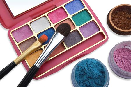 Cosmetics and brushes for a make-up on a light backgroundの写真素材