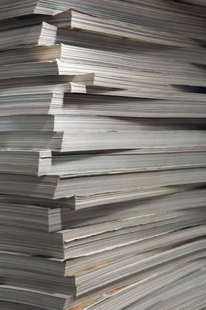 Close-up of a pile of old thick magazinesの写真素材