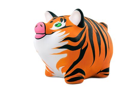 The skin of a tiger, is drawn on a Piggy Bankの写真素材