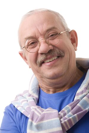 Portrait on a white background, smiling elderly man in glassesの写真素材