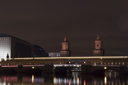 Oberbaum bridge Oberbaumbruecke in Berlin, Kreuzberg at nightの写真素材