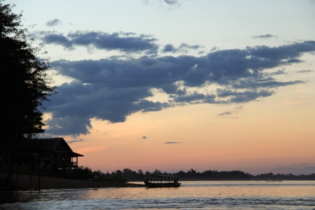 six pm at the river in laosの写真素材