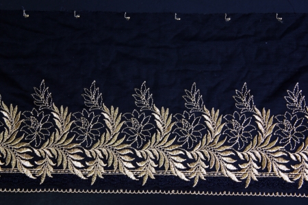 gold leaf lacework on black background