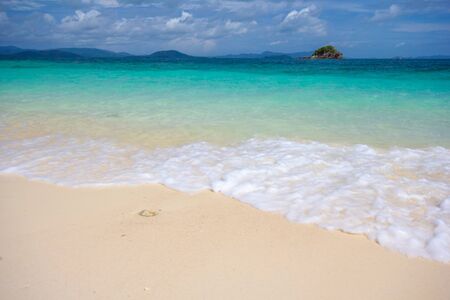 Beautiful beach in Andaman sea against blue sky at Phuket Thailand の写真素材