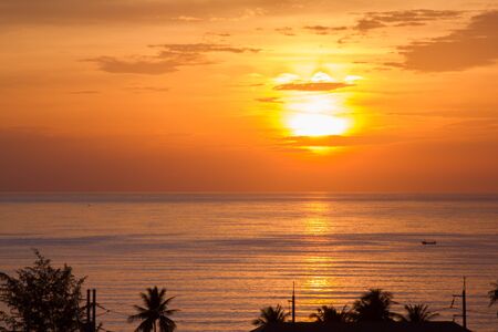 Beautiful sunset above the sea Patong, Phuket, Thailandの写真素材