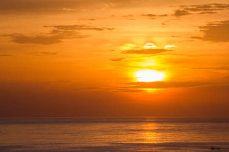 Beautiful sunset above the sea Patong, Phuket, Thailandの写真素材
