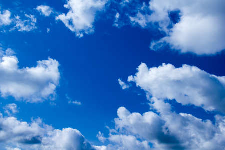 blue sky background with white cloudsの写真素材