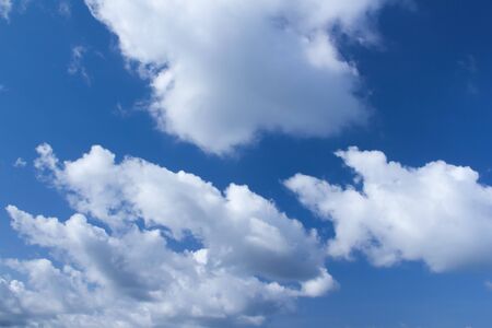blue sky background with white cloudsの写真素材