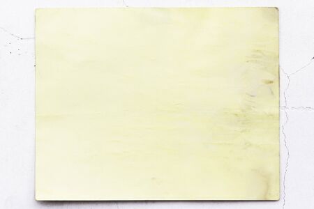 old yellow wallpaper on grunge wall