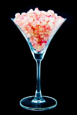 Thai Ripe pomegranate fruit in glasses on black backgroundの写真素材