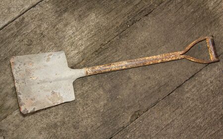 Shovel on a cement floorの写真素材