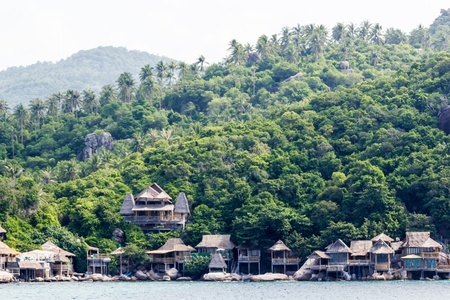 Bungalows on the rocks by the sea on Koh Tao, Thailand.