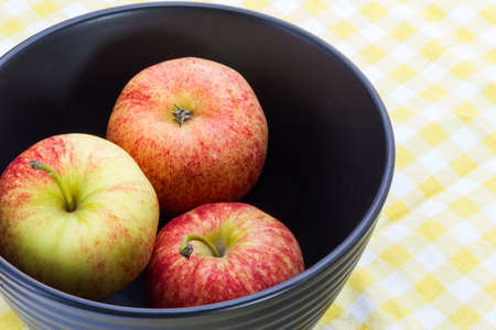 Red Apples in Black Bowlの写真素材