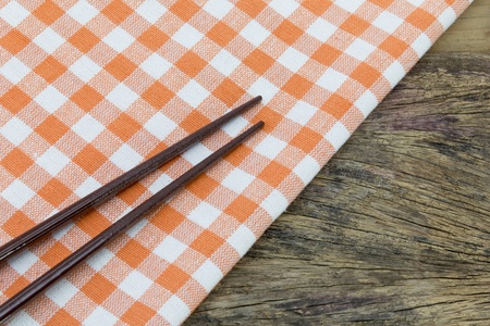 Tablecloth on wooden table backgroundの写真素材