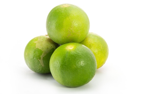 Fresh limes Isolated on whiteの写真素材