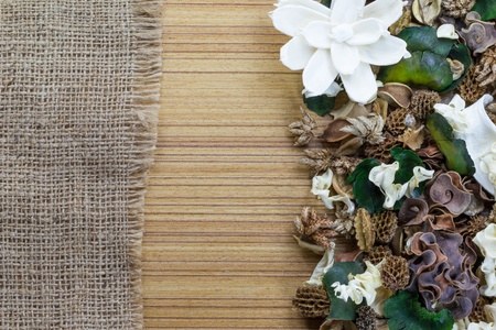 Dry flowers frame on Sackcloth background