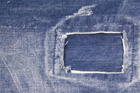 Blue jean texture with a hole