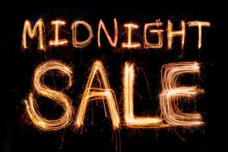 Midnight sale sparkler firework light alphabetの写真素材