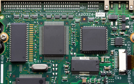 Closeup of electronic circuit board with processorの写真素材