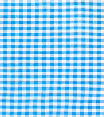 Blue and white plaid textile fabric background の写真素材