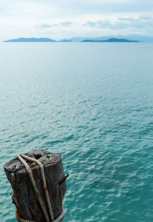 Wooden pier in tropical seaの写真素材