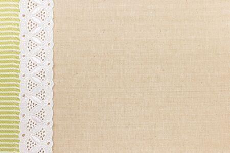 Fabric textile texture with white lace design for backgroundの写真素材