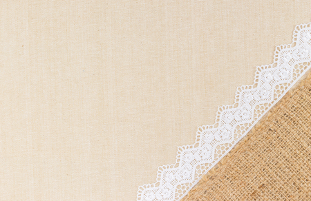 Lace border over Canvas texture design for backgroundの写真素材