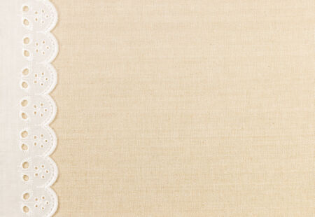 Lace border over Canvas texture design for backgroundの写真素材