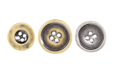 Metal sewing buttons collection isolate on white backgroundの写真素材