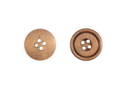 Wooden sewing button isolate on white backgroundの写真素材