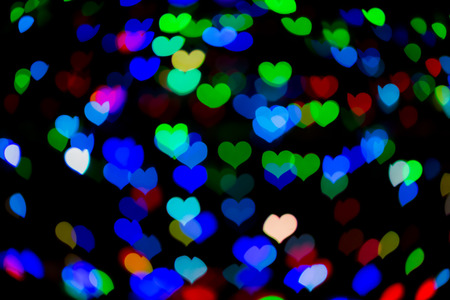Out of focus bokeh light - heart bokeh as valentine's day backgroundの写真素材
