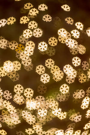 Abstract Winter Background snowflakes lights bokehの写真素材