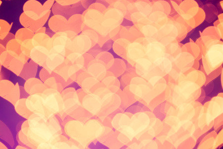 Defocused heart bokeh on christmas light backgroundの写真素材